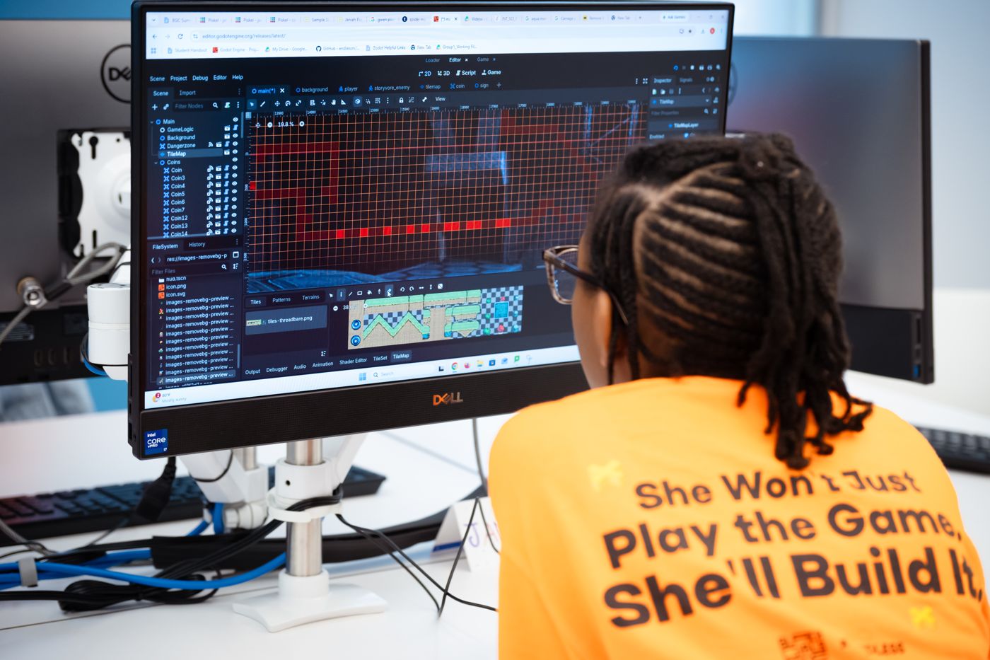 A student builds a game level in the Godot editor