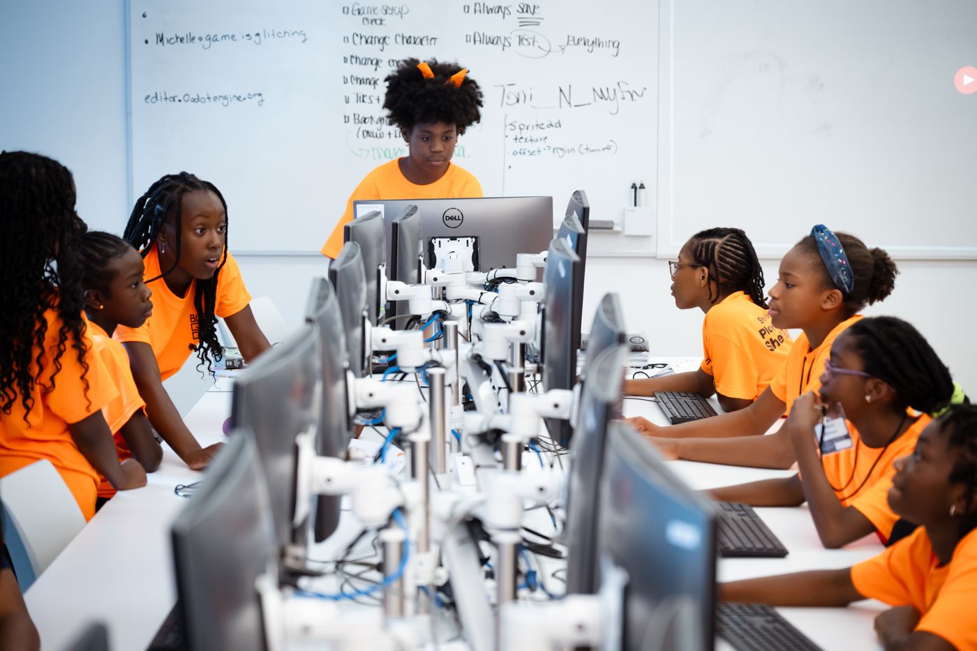 Students working across a computer lab