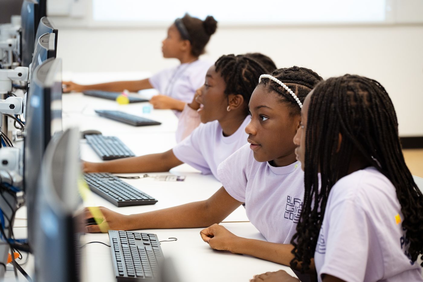 Students focused on their screens